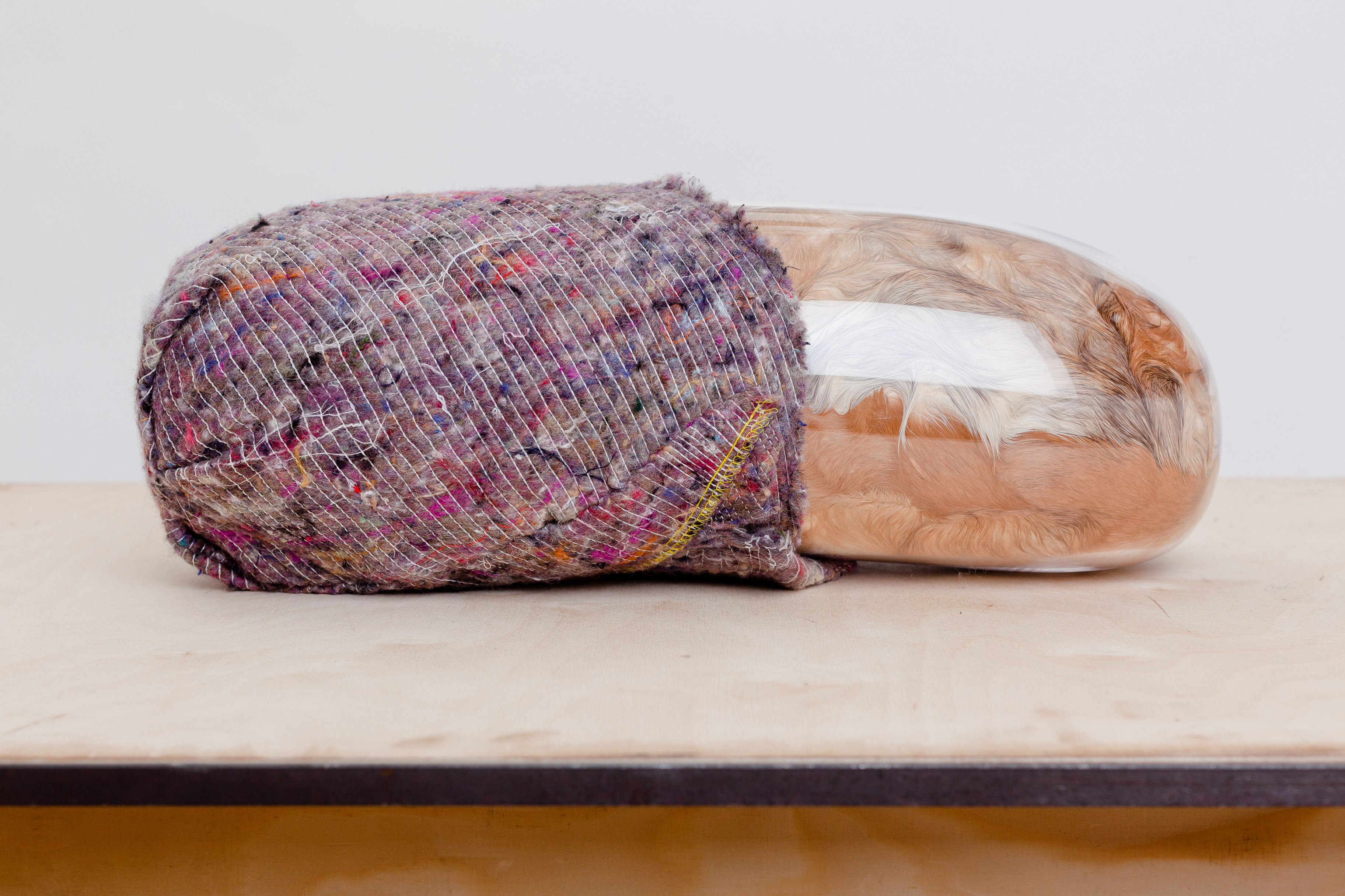 Adeline de Monseignat, Mother in child, 2012, Vintage Fur, pillow filler, glass, transit blanket, steel, wood, mirror, Glass Sculpture, 50 x 19 x 18 cm, Table 90 x 62 x 80 cm, Cell 110 x 110 x 160 cm.2A
