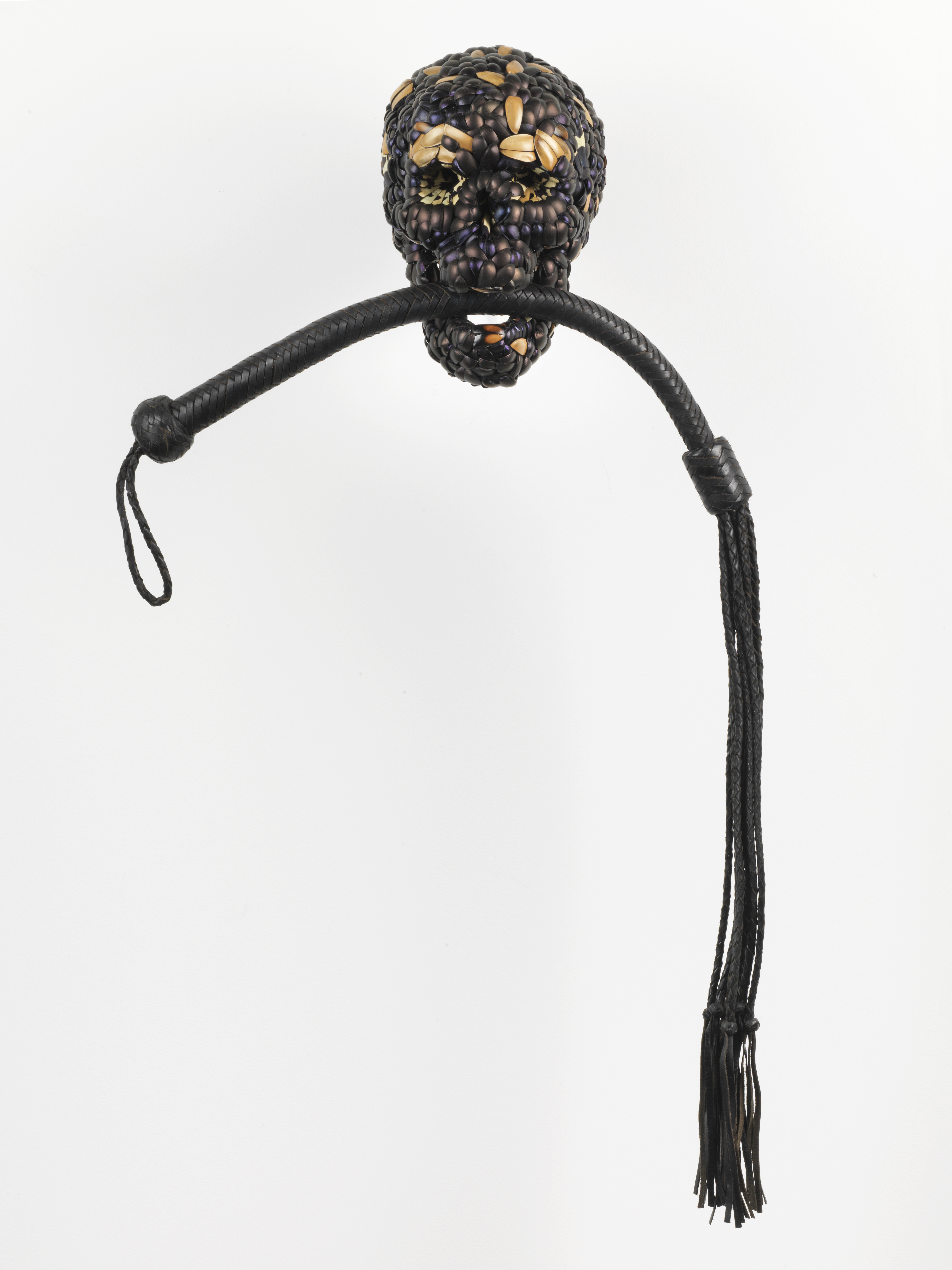 Jan Fabre, Skull with Whip, 2013, mixture of jewel beetle wing-cases, polymers, leather, 90 x 49 x 22 cm